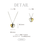 fragile heart necklace with green heart moissanite.