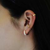Three-Dimensional Enamel Hoop Earrings.