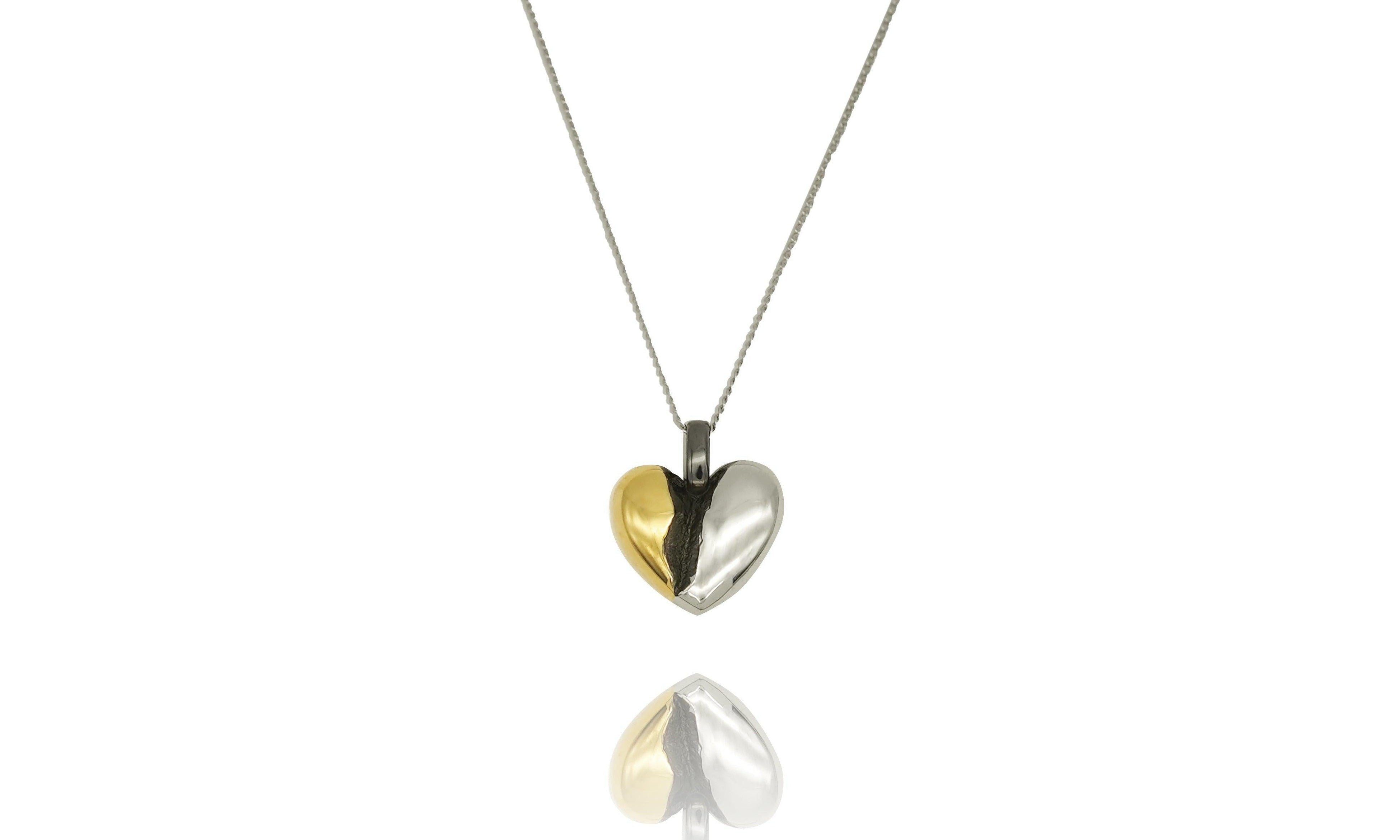 fragile heart necklace with green heart moissanite.