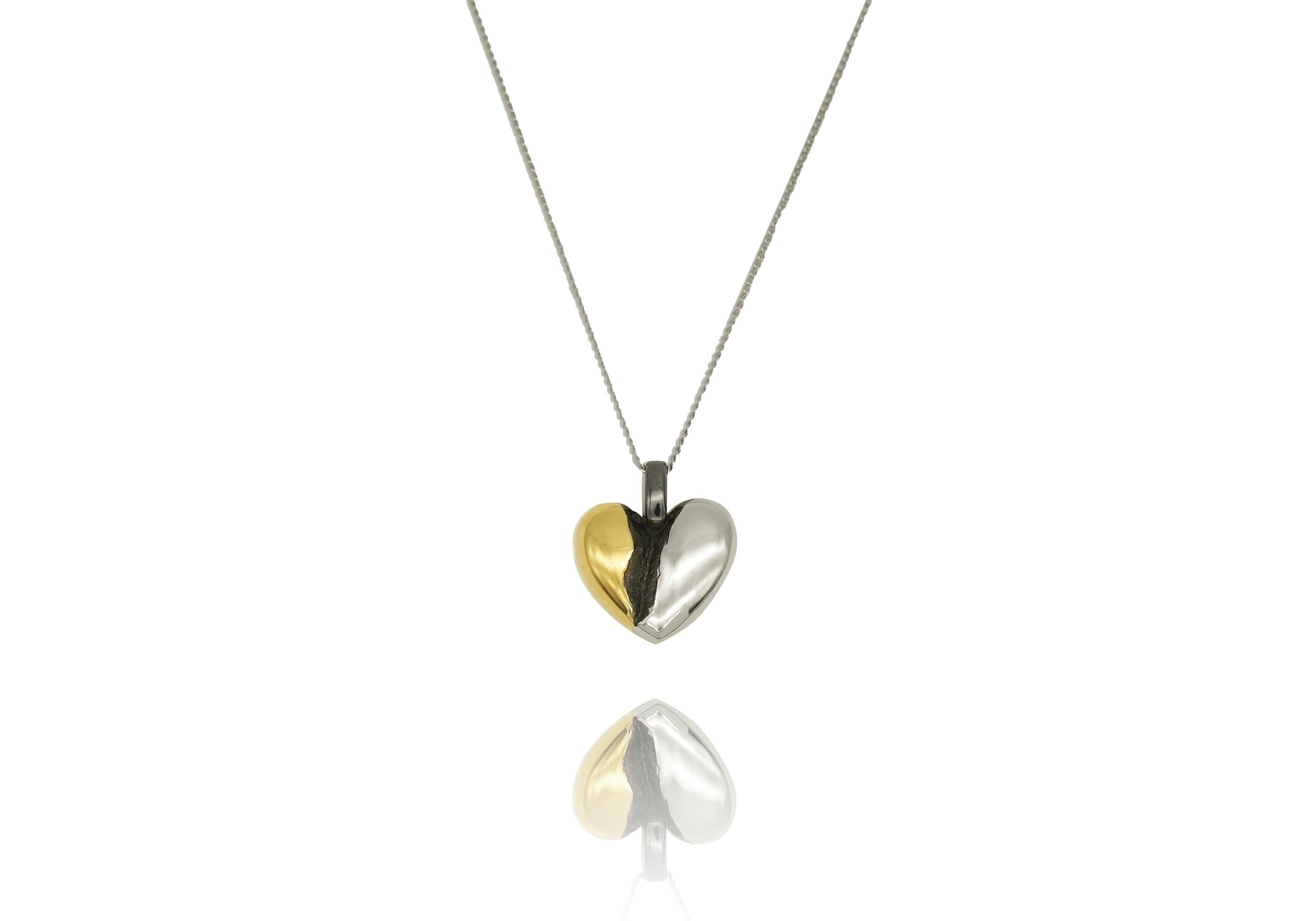 fragile heart necklace with green heart moissanite.