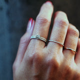 Artifact Triple Eternity Topaz Ring