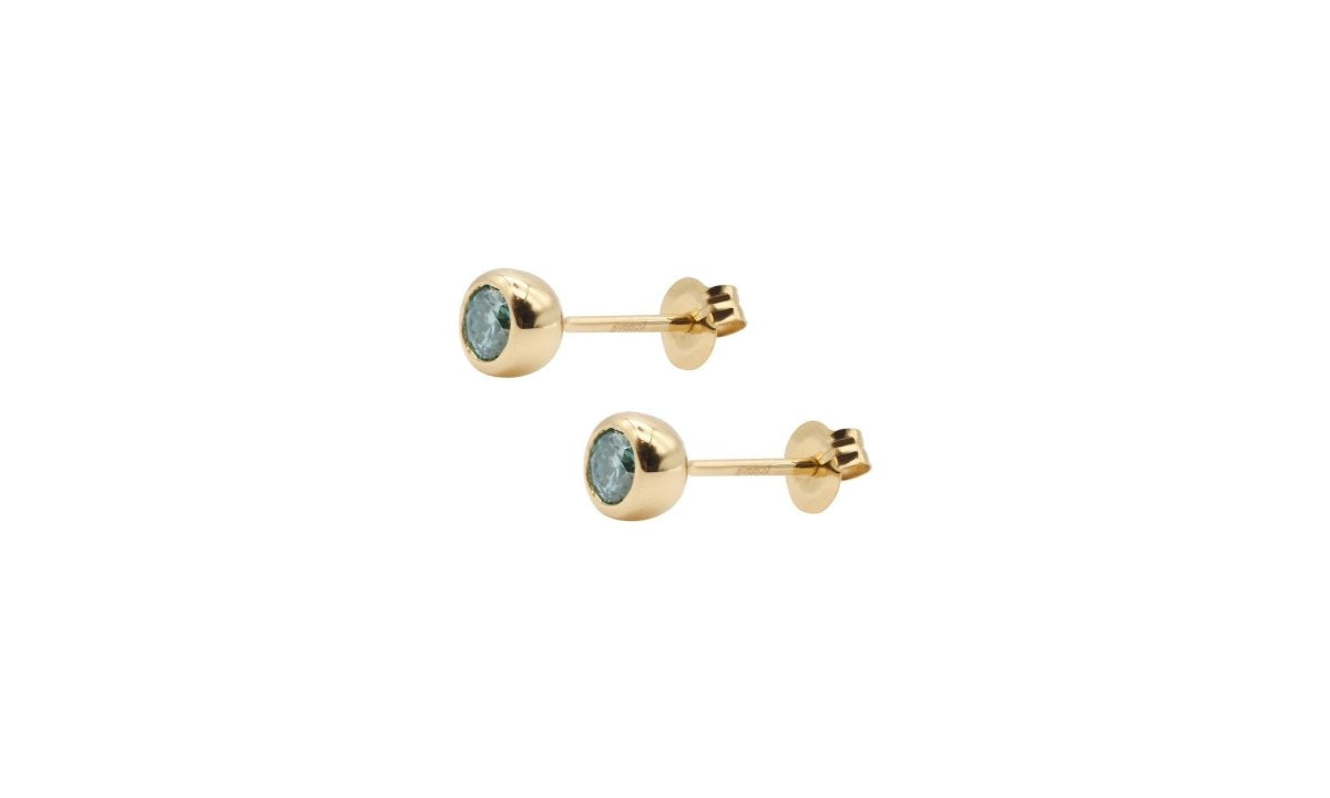 Bezel Pierce with Green Moissanite.