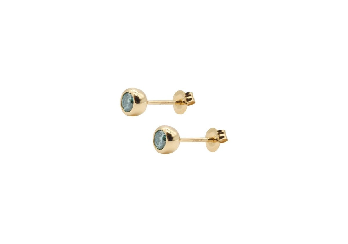 Bezel Pierce with Green Moissanite.