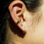 Circle pop earring.