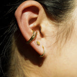 Circle pop earring.