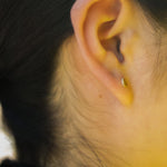 Circle pop earring.