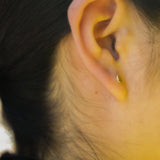 Circle pop earring.