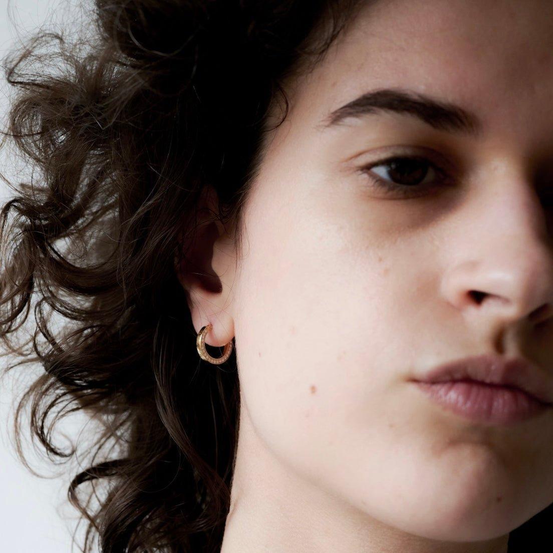 Pop hoop earring.