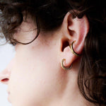 Pop hoop earring.