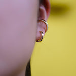 Pop hoop earring.