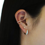 Three-Dimensional Enamel Hoop Earrings.